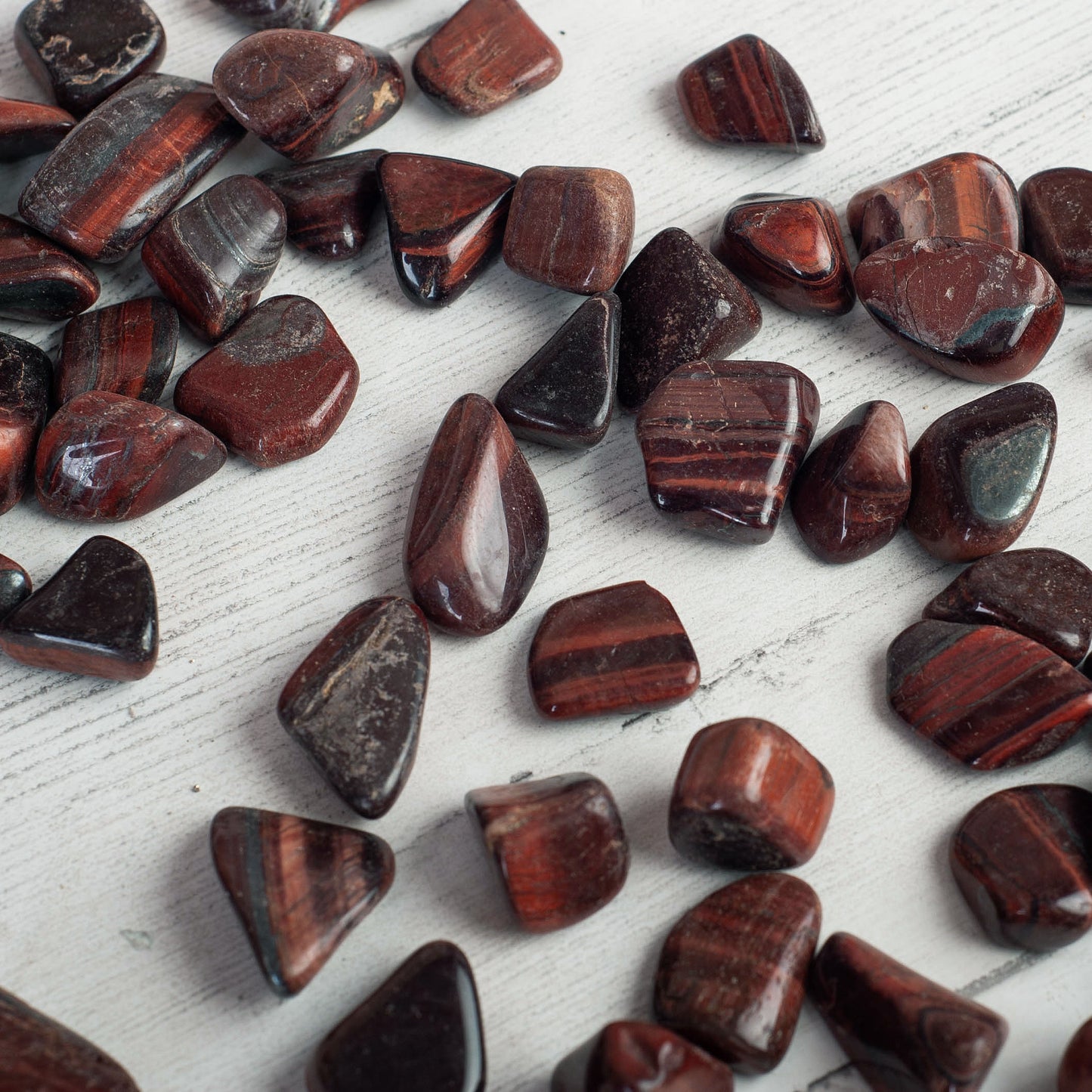 RED TIGERS EYE TUMBLED CRYSTAL